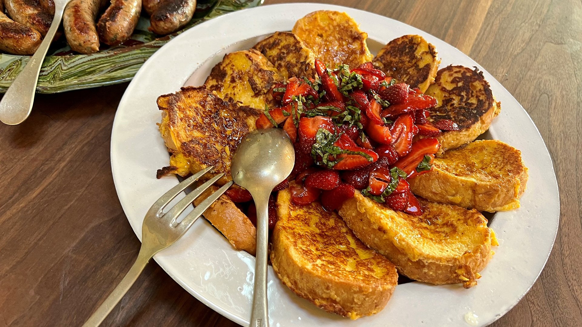 Savory French Toast with Homemade Sausage Patties and Warm Honey, Strawberries, and Basil Recipe