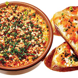 Scrambled Eggs with Almond Romesco, Bucheron Cheese, and Tomato Confit Toast Recipe