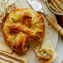 Air Fryer Baked Brie with Pesto, Sundried Tomatoes and Artichoke Hearts Recipe