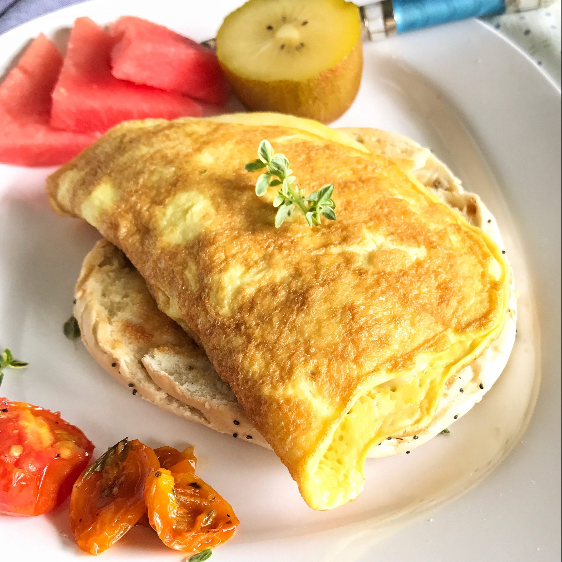 Cheese Omelet With Roasted Tomatoes and Onions Recipe