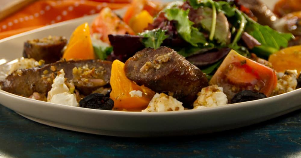 Grilled Lamb Sausage with Goat Cheese, Heirloom Tomatoes, Olives, and Herbs Recipe