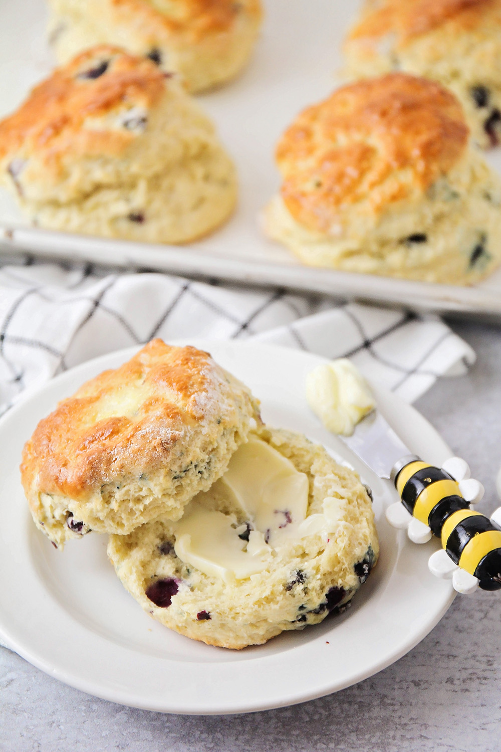 Huckleberry Scones with Nutmeg, Clotted Cream Whipped Cream and Huckleberry Reduction