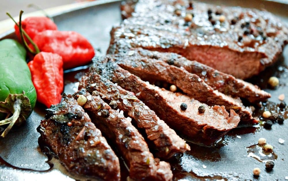 Molasses Marinated Flank Steak with Roasted Red Peppers Recipe