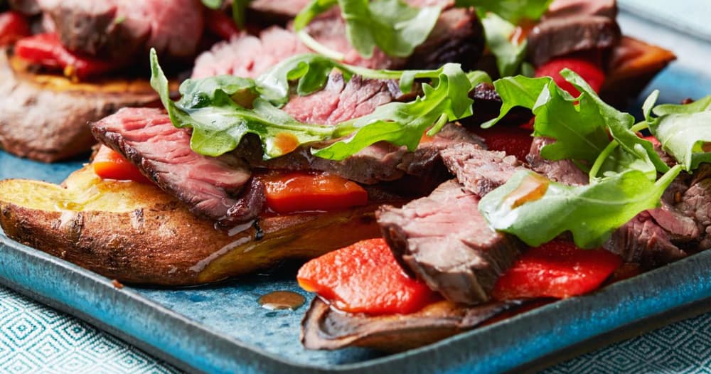 Sweet Potato Toast with Steak, Roasted Peppers and Arugula