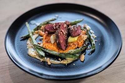 Pan Roasted Ostrich with Crispy Sweetbreads, Salsify Puree, Potato Puree, Oven-Dried Tomatoes, Pencil Asparagus, Enoki Mushrooms, and Glace Des Medoc Recipe