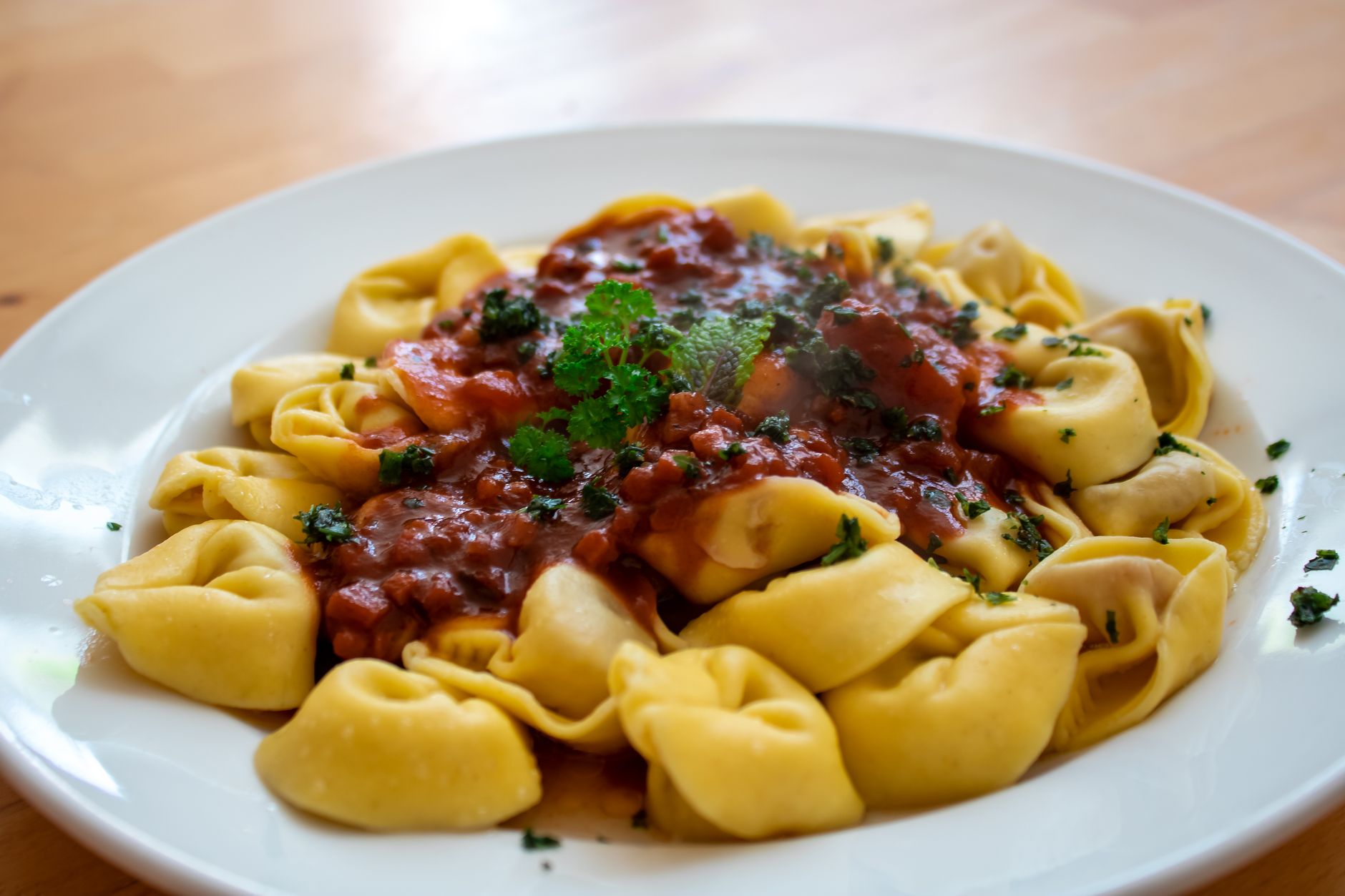 Agnolotti with Sausage and Ricotta Filling and Burst Cherry Tomato & Pancetta Sauce