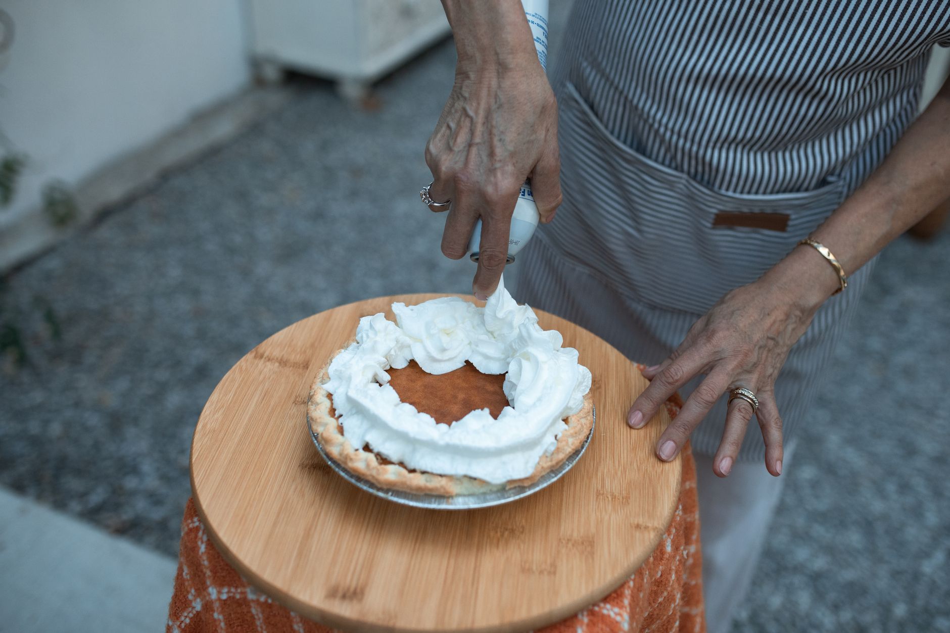 Pumpkin Pie with Whipped Cream and Cinnamon